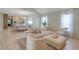 Bright, open living room with modern furnishings and abundant natural light at 11721 Camden Park Dr, Windermere, FL 34786
