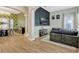 Bright and spacious living room featuring stylish decor and hardwood floors at 11721 Camden Park Dr, Windermere, FL 34786