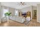 Bright living room with hardwood floors, large windows, and comfortable seating at 11721 Camden Park Dr, Windermere, FL 34786