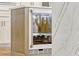 A temperature-controlled wine fridge is perfect for storing wine bottles at 11721 Camden Park Dr, Windermere, FL 34786
