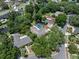 Aerial view of neighborhood homes featuring private pools and mature trees providing a serene and private atmosphere at 120 Springwood Trl, Altamonte Springs, FL 32714
