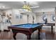 Game room with pool table, custom lighting, wet bar, and ample space for entertaining at 120 Springwood Trl, Altamonte Springs, FL 32714