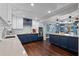 Newly renovated kitchen features white cabinets, stainless steel appliances, and granite countertops at 120 Springwood Trl, Altamonte Springs, FL 32714