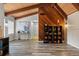 Open floor plan with wood ceilings, wood beams, and wood-look floors at 120 Springwood Trl, Altamonte Springs, FL 32714