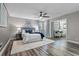 Spacious main bedroom featuring a ceiling fan and sitting area at 120 Springwood Trl, Altamonte Springs, FL 32714