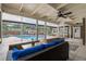 Relaxing outdoor patio with seating area overlooking a sparkling pool with a covered patio at 120 Springwood Trl, Altamonte Springs, FL 32714
