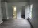 This primary bedroom features a new bathroom and walk-in closet at 1241 Cleveland Ave, Apopka, FL 32703