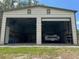 Oversized garage with space for vehicles and storage at 1242 Liza St, St Cloud, FL 34771