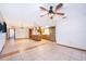 Open-concept living area features tile floors, ceiling fans, and ample natural light at 1242 Liza St, St Cloud, FL 34771
