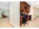 Functional home office with custom built-ins and desk space, perfect for remote work or study, plus an adjacent sitting room at 1355 Hibiscus Ave, Winter Park, FL 32789