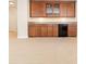 Entertainer's dream with custom cabinets, beverage center, and mini-fridge for convenient refreshment in the living space at 1355 Hibiscus Ave, Winter Park, FL 32789