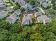 An aerial view of a well-maintained home with a spacious backyard and patio area at 1438 Stickley Ave, Celebration, FL 34747