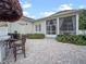 Patio showcasing a tiki bar, landscaping and lush greenery at 1438 Stickley Ave, Celebration, FL 34747
