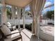 Covered porch with outdoor furniture and a view of the yard at 1438 Stickley Ave, Celebration, FL 34747