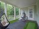 Relaxing screened porch with outdoor furniture and a tranquil view at 1438 Stickley Ave, Celebration, FL 34747