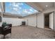 Charming back patio with brick pavers, string lights, and space for outdoor seating, perfect for relaxing at 14390 Orchid Island Dr, Orlando, FL 32827