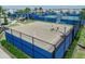 An aerial view of a fenced basketball court at 14390 Orchid Island Dr, Orlando, FL 32827