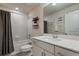 Clean bathroom with shower-tub combo and white vanity with a large mirror at 14390 Orchid Island Dr, Orlando, FL 32827