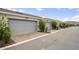 Exterior view of garages in a community, offering convenient parking and storage at 14390 Orchid Island Dr, Orlando, FL 32827