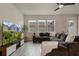 Comfortable living room with sectional sofa and modern entertainment center at 14390 Orchid Island Dr, Orlando, FL 32827