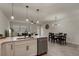 Open-concept kitchen view of the living room and dining area at 14390 Orchid Island Dr, Orlando, FL 32827