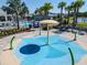Community splash pad with colorful design and playful water features for Gathering fun at 14390 Orchid Island Dr, Orlando, FL 32827