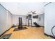 Spacious basement featuring laminate flooring, ceiling fan, workout equipment, and storage at 146 Hidden Pointe Ln, Groveland, FL 34736