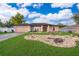 Charming single-story home with well-manicured lawn and rock garden at 146 Hidden Pointe Ln, Groveland, FL 34736