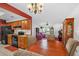 Open-concept living space seamlessly blends kitchen, dining, and seating areas for modern living at 1588 Alloway Dr, Deltona, FL 32738