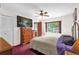 Inviting main bedroom with large TV, dresser, and a comfortable bed at 1588 Alloway Dr, Deltona, FL 32738