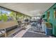 Enclosed patio provides an airy space for relaxing and entertaining, with a view of the outdoors at 1588 Alloway Dr, Deltona, FL 32738