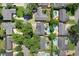 Aerial view of property and neighborhood showcasing backyard pools at 2020 Geronimo Trl, Maitland, FL 32751
