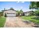 Charming single-story home boasting a well-manicured lawn, landscaping, and a private driveway at 2020 Geronimo Trl, Maitland, FL 32751