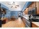 Traditional kitchen with wooden cabinets, stainless steel appliances, and a casual eating area at 2020 Geronimo Trl, Maitland, FL 32751