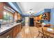 Well-appointed kitchen with wood cabinets, stainless steel appliances, and ample counter space at 2020 Geronimo Trl, Maitland, FL 32751