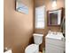 Charming powder room with updated fixtures and a neutral color palette at 2020 Geronimo Trl, Maitland, FL 32751