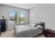 Neutral bedroom with two windows allowing for an abundance of natural light at 2171 Timber Creek Ln, Clermont, FL 34715