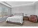 Bright main bedroom with tray ceiling, a comfortable bed, and serene atmosphere at 2171 Timber Creek Ln, Clermont, FL 34715