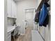 Practical mud room with a built-in desk, storage, and a bench, offering convenience and organization at 2171 Timber Creek Ln, Clermont, FL 34715