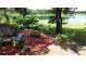 Picturesque backyard with a patio, bench, and tranquil lake views, perfect for outdoor living at 238 Lake Dr, Orlando, FL 32835