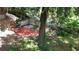 Scenic backyard with a bench, brick patio, and potential for relaxation and outdoor activities at 238 Lake Dr, Orlando, FL 32835