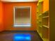 Bright bedroom featuring large windows, natural light, and a spacious closet at 238 Lake Dr, Orlando, FL 32835