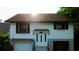 Two-story home featuring a sunny exterior and well-maintained landscaping at 238 Lake Dr, Orlando, FL 32835