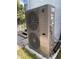 Outdoor HVAC unit on a concrete pad, with visible components and connections, in a landscaped area at 238 Lake Dr, Orlando, FL 32835