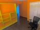 Home office area with storage and a chair for a functional workspace at 238 Lake Dr, Orlando, FL 32835