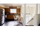 Eat-in kitchen and staircase provide a cozy space for dining and access to the upper floors of the home at 238 Lake Dr, Orlando, FL 32835