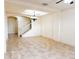 A large living room showcasing tile flooring, a chandelier, and a staircase at 2520 Bella Vista Dr, Davenport, FL 33897