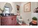 Stylish half bathroom features a vanity with ample storage and contemporary fixtures at 314 Edgewood Ct, Kissimmee, FL 34759