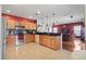 Modern kitchen equipped with stainless steel appliances, ample cabinet space, and a functional layout at 314 Edgewood Ct, Kissimmee, FL 34759