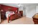 Comfortable main bedroom boasts an expansive layout with neutral colors at 314 Edgewood Ct, Kissimmee, FL 34759